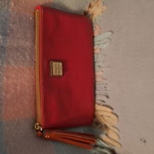 Dooney and Bourke Carrington pouch in red pebble leather